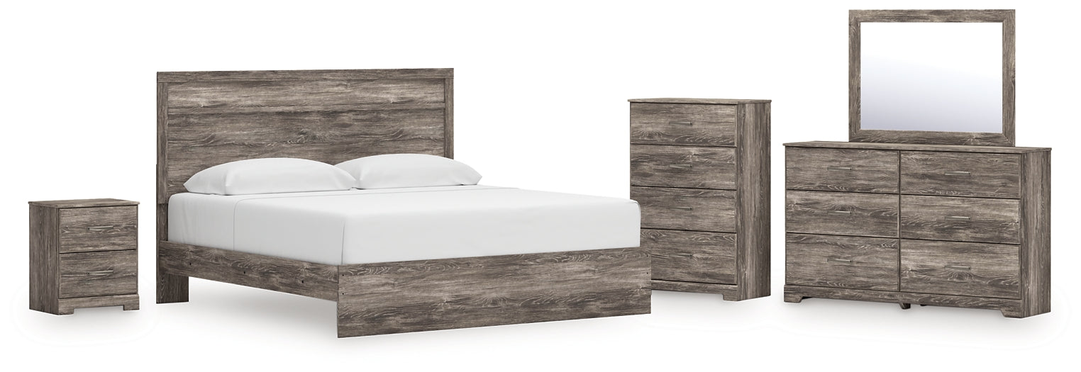 Ralinksi King Panel Bed with Mirrored Dresser, Chest and Nightstand